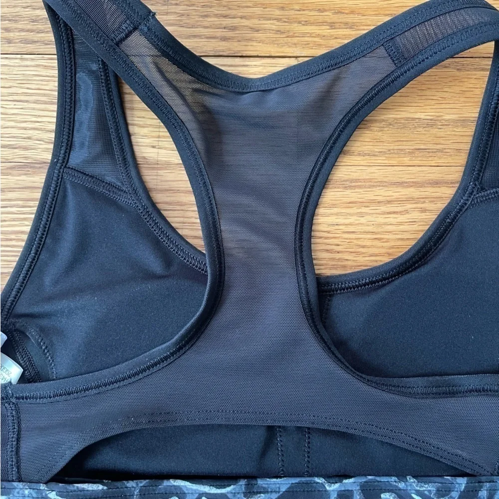 NEW Reebok TS Lux Racerback Sports Bra Leopard Black Size XS NWT